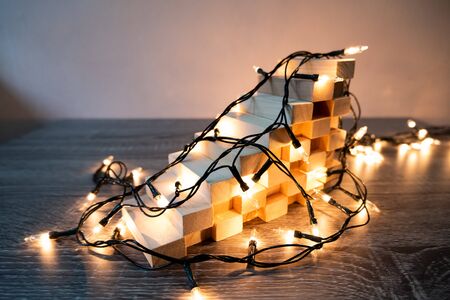 Wooden block tower with party light, planning a party for the event where successful in project for use in various festivals.の写真素材