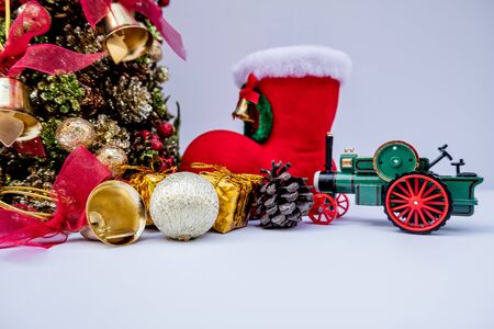 Beautifully decorated Christmas tree with a holiday party beginning in the new year and crossing to year 2020.の写真素材