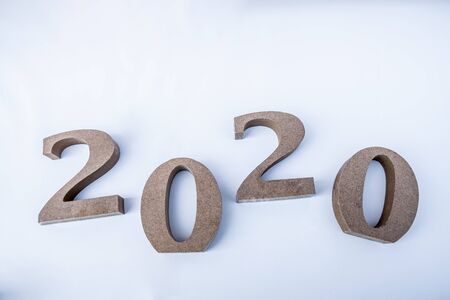 2020 wooden character, set new business goals with New Year 2020.