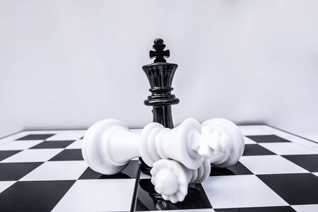 The chess board shows leadership, followers and business success strategies.