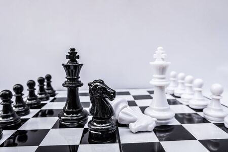 The chess board shows leadership, followers and business success strategies.