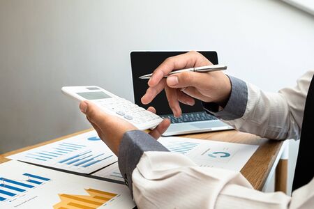 business leader woman analyzing the charts and graphs for planning management new project.