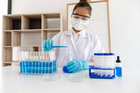 Medical scientists have experimented with liquid chemicals in vitro to analyze viral data in...