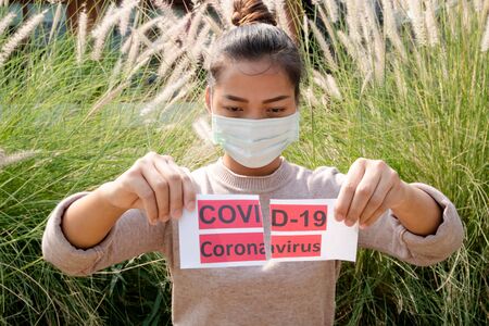 Young woman wearing protection face mask To prevent Virus infection, epidemics covid-19 and PM 2.5.の写真素材