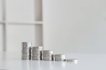 Bar graph coin stepping up a successful and economical business for retirement concepts.の写真素材