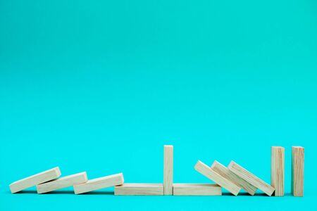 Image of blocks wood game to growing up of business. Risk of management and strategy plan.