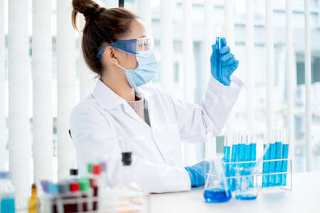 Medical scientists have experimented with liquid chemicals in vitro to analyze viral data in...
