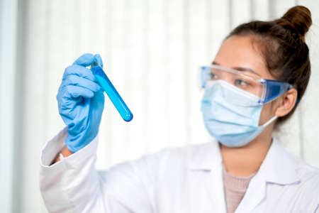 Medical scientists have experimented with liquid chemicals in vitro to analyze viral data in...