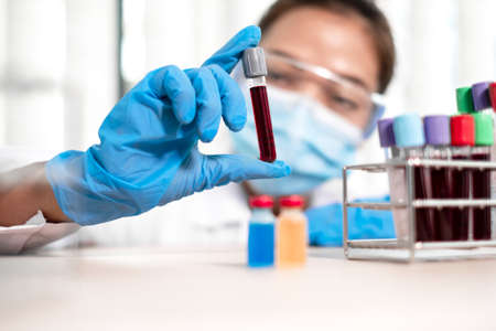 Professional doctors perform find virus tests from samples of blood tests to diagnose coronary virus...