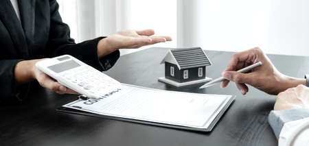 Real estate agents have a rental contract form for customers to sign a contract by the formal rental agreement Rental and insurance concepts.の写真素材