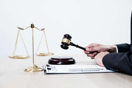 Judges gavel, Professional male lawyers work at a law office There are scales, Scales of justice,...