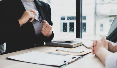 Businesswoman makes an agreement with the money proposed by his partner to bribe in the company. The...