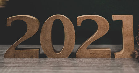 Wooden figures 2021 happy new year new year's eve welcome the new year.
