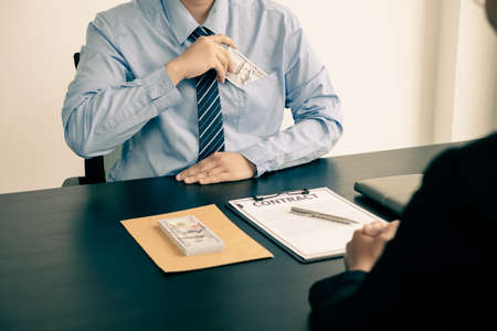 Corruption. Businessmen make an agreement with the money proposed his partner to bribe in the office...
