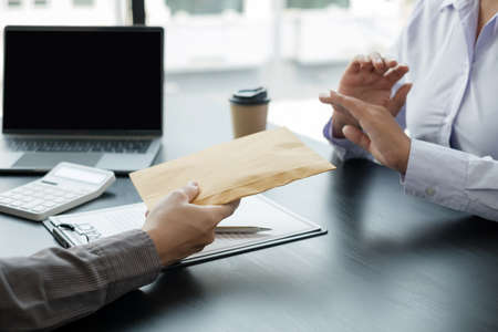 Corruption. The businessman denies the money proposed by his partner to bribe the concept of bribery and corruption.の写真素材