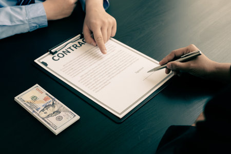 Corruption. Businessmen make an agreement with the money proposed his partner to bribe in the office and make a contract under an agreement. Illegal money fraud The concept of bribery and corruption.の写真素材