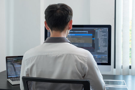 Programmer, Man working with computer programming, professional development, and coding technology,...