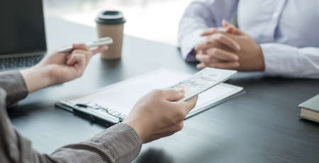Corruption. Businessmen make an agreement with the money proposed his partner to bribe in the office...