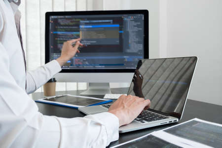 Programmer, Man working with computer programming, professional development, and coding technology,...