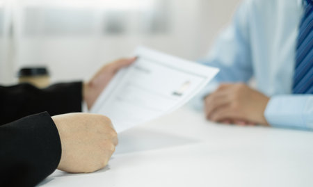 HR Manager talks to job applicants for job interviews about careers and Her personal history in the company. Employment and Recruitment concepts.の写真素材
