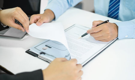 HR Manager talks to job applicants for job interviews about careers and Her personal history in the company. Employment and Recruitment concepts.の写真素材