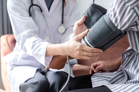 The female doctor measured blood pressure, the patient examined the heartbeat and sat down to talk...