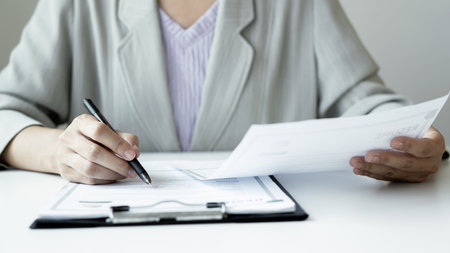 Business woman employer holding resume hiring recruit looking cv resume to hire candidates,...
