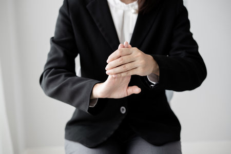 Woman hand with wrist pain numbness and pain in the palm of the hand has pain and tingling in the...