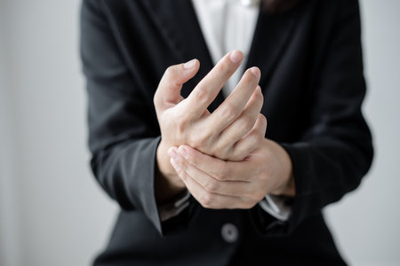 Woman hand with wrist pain numbness and pain in the palm of the hand has pain and tingling in the...