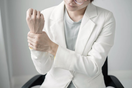 Woman hand with wrist pain numbness and pain in the palm of the hand has pain and tingling in the...