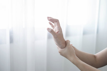 Woman hand with wrist pain numbness and pain in the palm of the hand has pain and tingling in the...