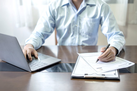 Business man employer holding resume hiring recruit looking cv resume to hire candidates, analyzing...