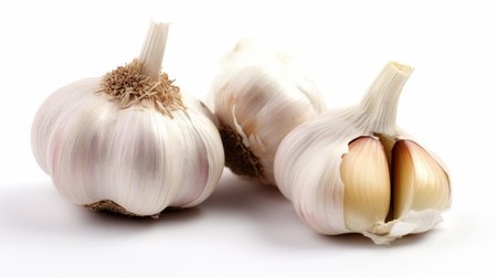 Gastronomic Minimalism: Garlic Isolated on White Background at Low Background. Detail of Garlic, Background on White Background.の素材
