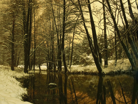 A flowing stream in the twilight of a winter evening.の写真素材