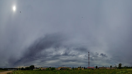 storm clouds formed in the sky in summer heat, panoramic view.