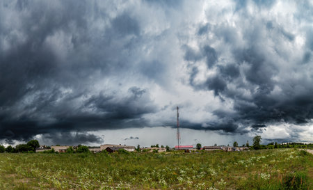 storm clouds over the city, industrial districtの写真素材