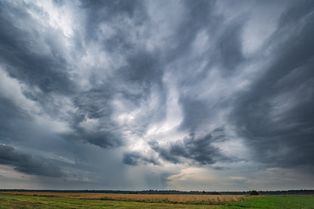 Storm clouds in the sky, rain on the horizon, summer season