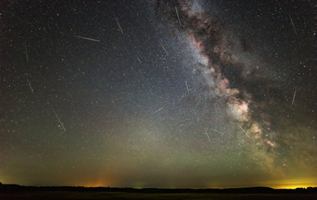 August night Perseids rain in the background of the night sky with the milky way, air glow