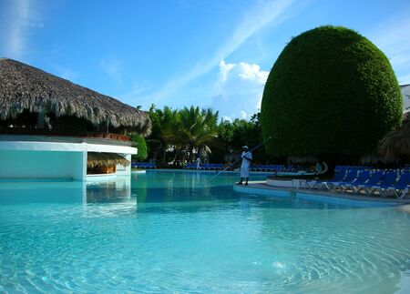   swimming pool at tropical resort       の写真素材