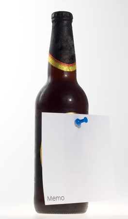 brown beet bottle with memo note attached with a pinの写真素材