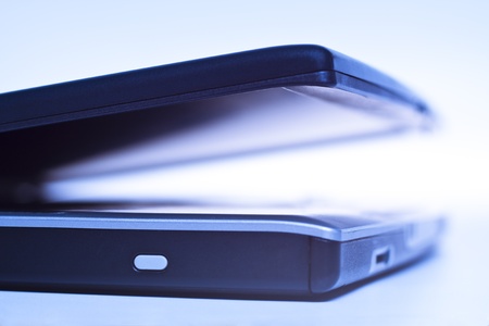 laptop closeup with blue lightning の写真素材