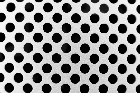 Silver backgroud with black holes abstact backgroundの写真素材