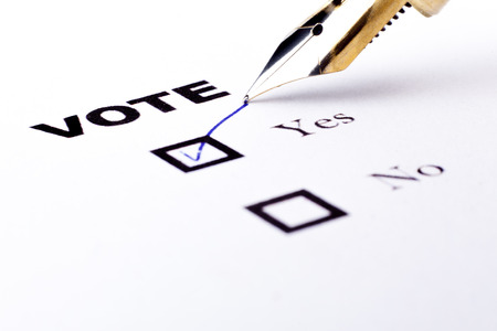 Voting yes or no checkbox with fountain pen yes marked with V の写真素材