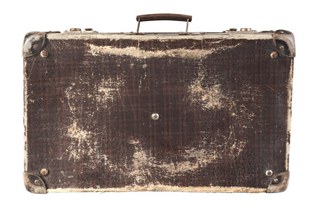 Old Brown used and weathered suitcase isolated on white backgroundの写真素材
