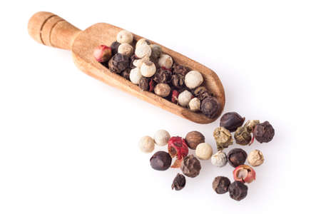 Black Pepper on Wood Spoon Isolated on White Backgroundの写真素材