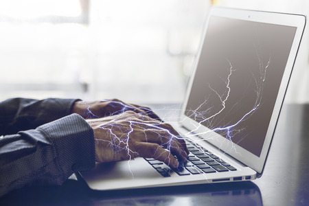 Image of a man who work on lapopの写真素材