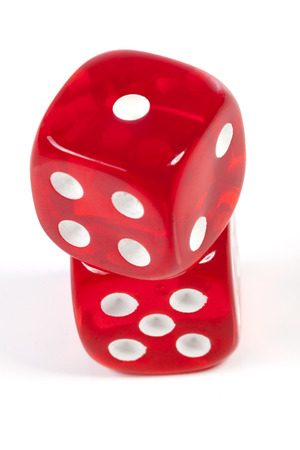 Isolated red casino dice on white ackgroundの写真素材