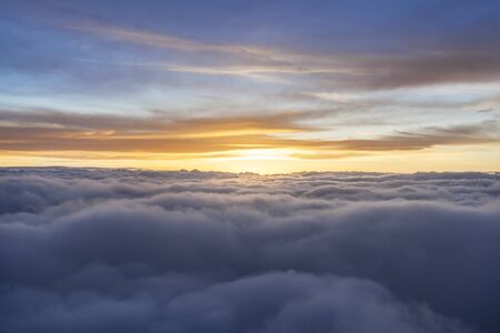 Fluffy Clouds With Sunrise During Morning Flight With Beautiful Colorsの写真素材