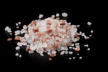 Pink Himalayan Salt Crystals on Black Backgroundの写真素材