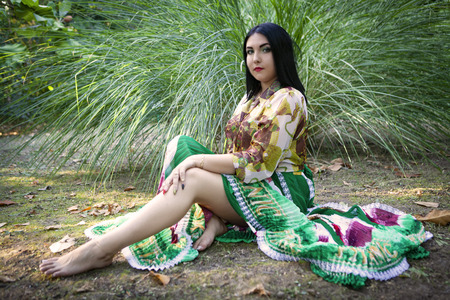 Youg Pretty Gipsy Girl in Traditional Gipsy Clothingの写真素材